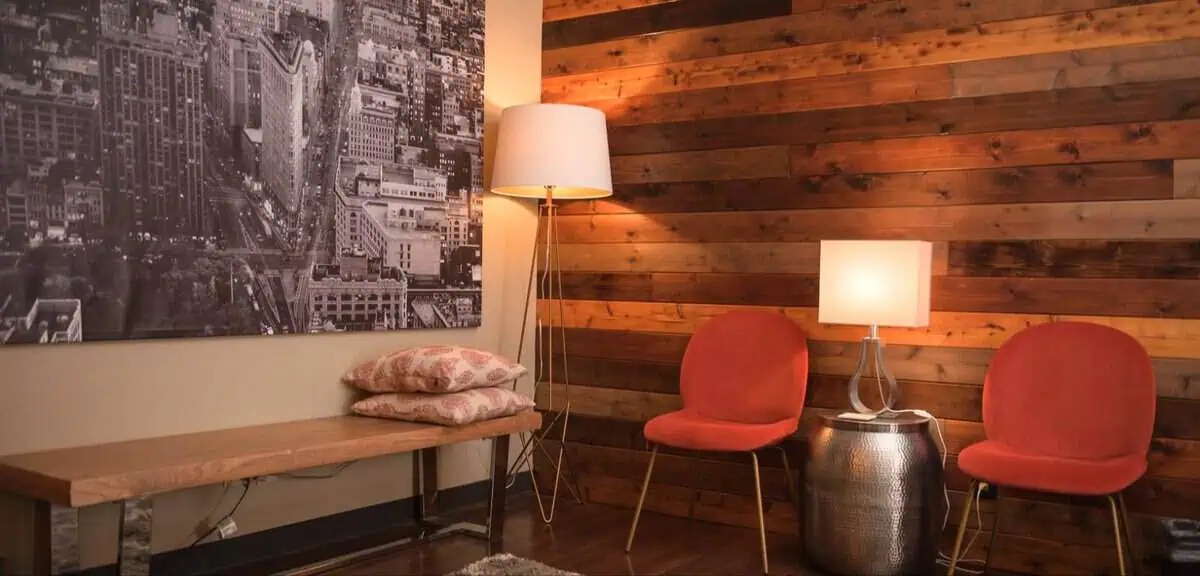 North Austin - Spicewood Springs Location - Just Mind Counseling Austin 7 Seating area with reclaimed wood wall at Just Mind North Austin