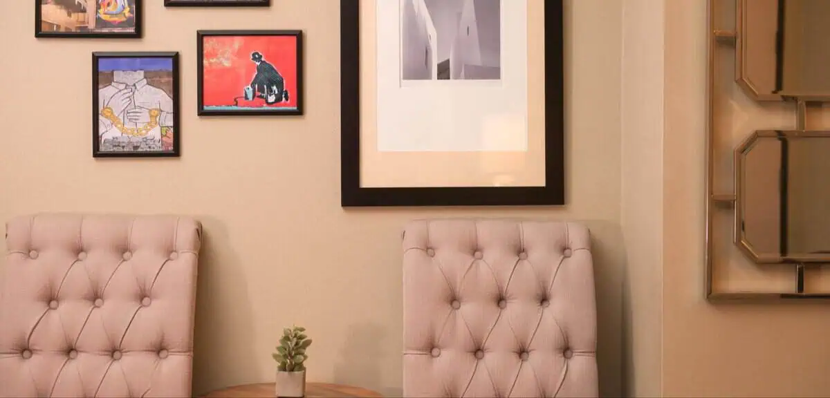 North Austin - Spicewood Springs Location - Just Mind Counseling Austin 10 Therapy office with armchairs and framed art at Just Mind North Austin